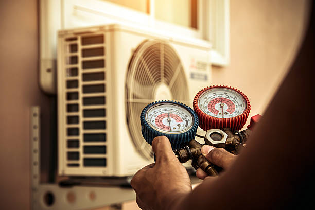 Professional Air Conditioning Service technician working in Mount Vernon, TX